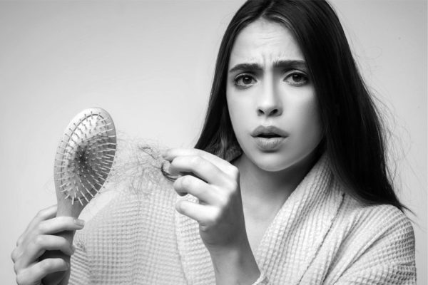 Hair Loss In Women: Common Causes & Effective Treatments