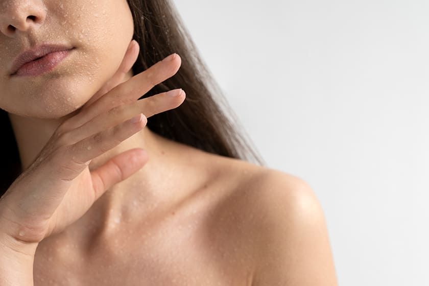 Women with Water Droplet on skin