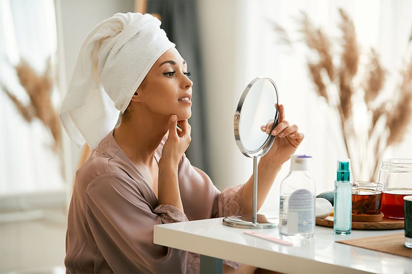 1. Women Lokking into mirror